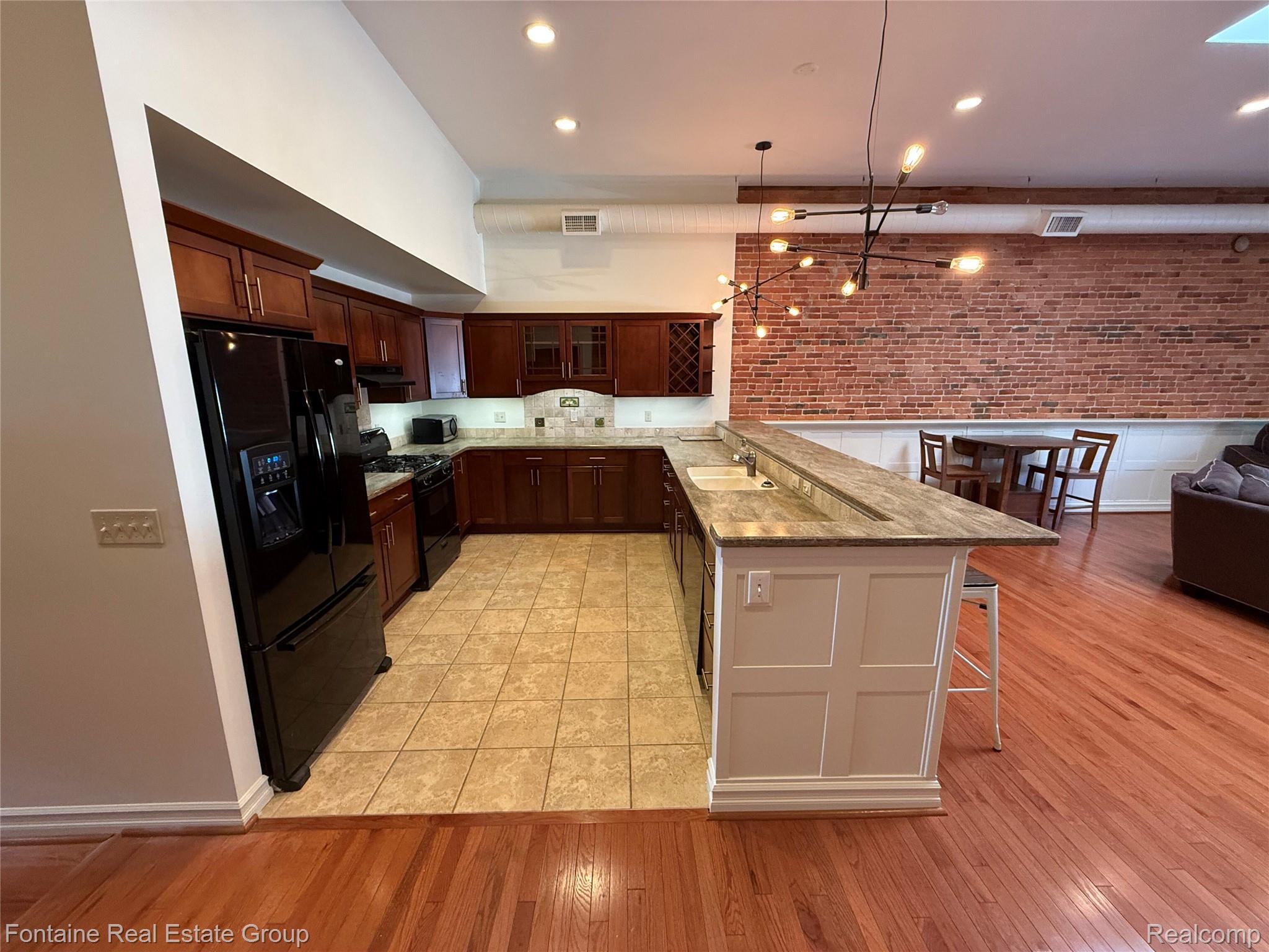 107 W Grand River Avenue