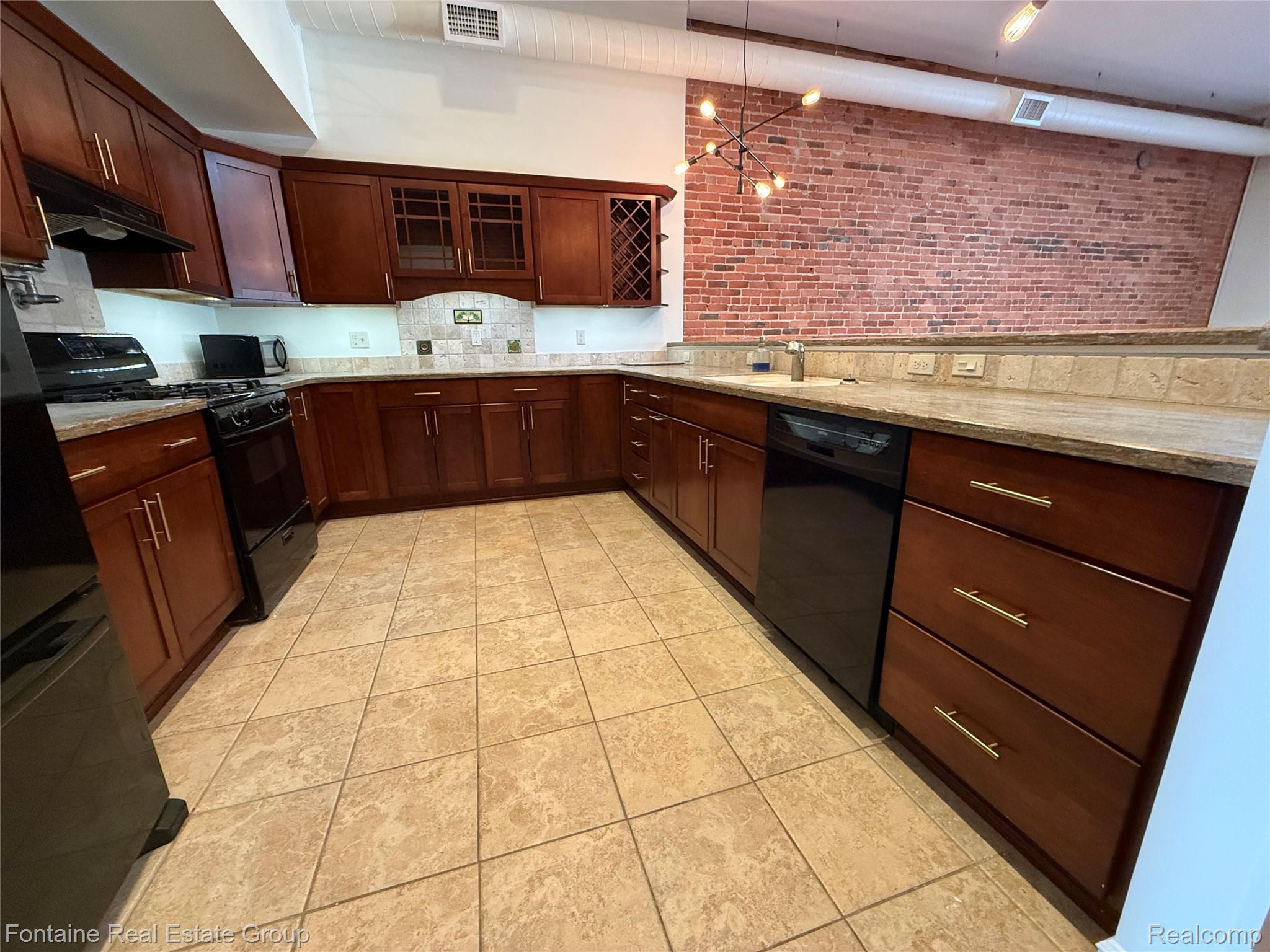 107 W Grand River Avenue