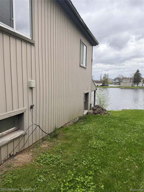 Photo of 208 Brittain Drive, Lake Orion Village, MI 48362 (MLS # 20261029266)
