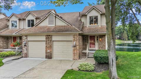 Photo of 54124 Buccaneers Bay, Shelby Charter Township, MI 48316 (MLS # 20261056005)