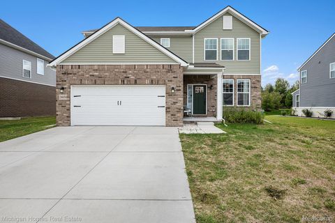 Photo of 24654 Beach Drive, Macomb Township, MI 48042 (MLS # 20251041000)