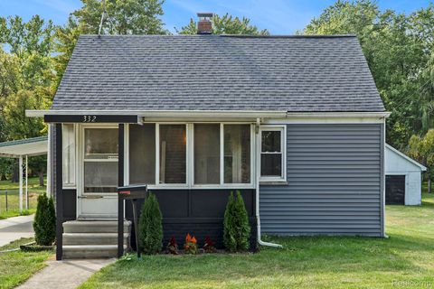 Photo of 332 Newton Drive, Lake Orion Village, MI 48362 (MLS # 20251034336)