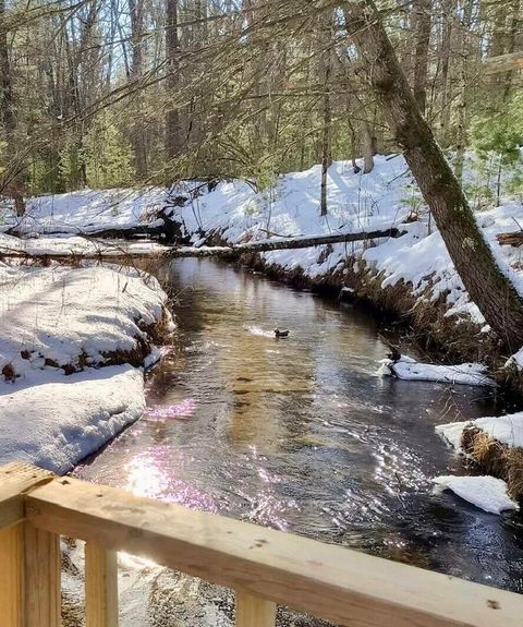 Photo of 3833 E Creek Wood Drive, Cherry Valley Township, MI 49623 (MLS # 81026009723)