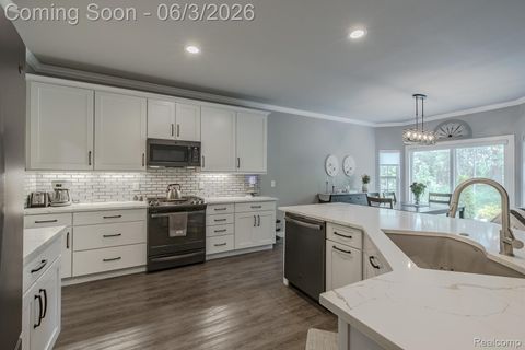 Tiny photo for 7466 Village Court, Springfield Charter Township, MI 48350 (MLS # 20261038545)