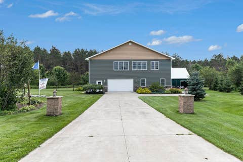 Photo of 6836 Wrenwood Drive, Mancelona Township, MI 49730 (MLS # 78080069607)