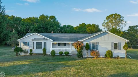 Photo of 300 Parkwood Drive, Metamora Village, MI 48455 (MLS # 58050190621)