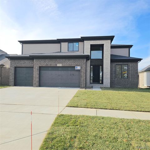 Photo of 50829 Mistwood Drive, Macomb Township, MI 48042 (MLS # 20261001931)