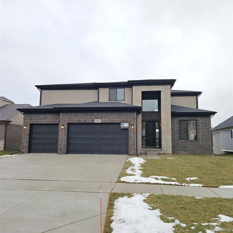 Photo of 50829 Mistwood Drive, Macomb Township, MI 48042 (MLS # 20261001931)