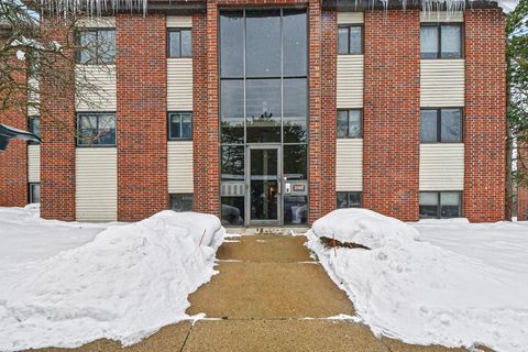 Photo of 3392 Devonwood Hills NE #F, Plainfield Charter Township, MI 49525 (MLS # 65026004397)