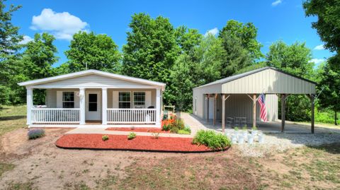 Photo of 3921 Woodman Road, Boardman Township, MI 49680 (MLS # 65025034011)