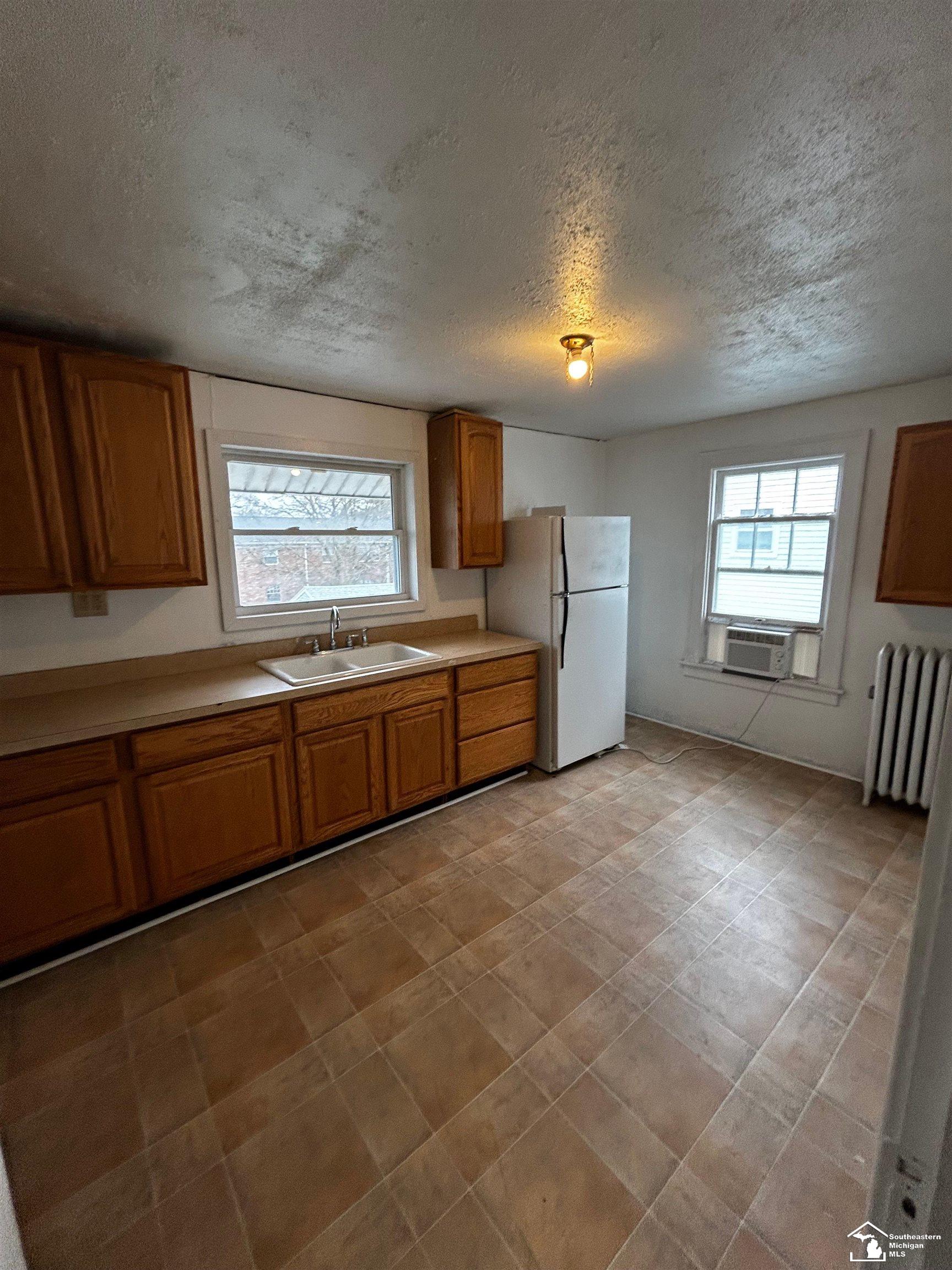 115 E 8th Street
