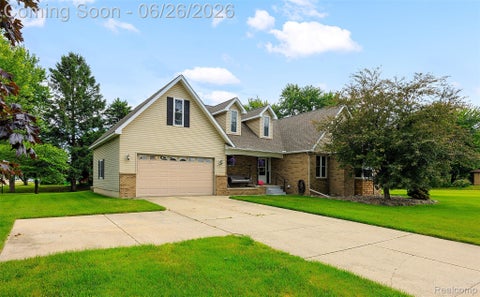Photo of 18570 Hollie Dr, Macomb Township, MI 48044 (MLS # 20261047220)