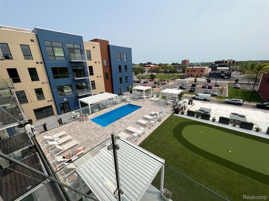 Photo of 166 Oak Street #410, Wyandotte City, MI 48192 (MLS # 20261027281)