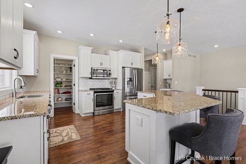 Tiny photo for 6737 Windsor Ridge Court NE #8, Plainfield Charter Township, MI 49341 (MLS # 65026005978)