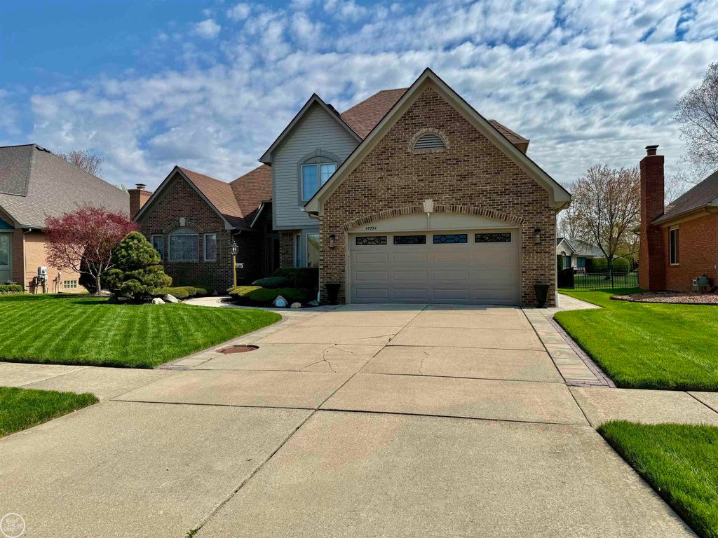 Photo of 47094 Burning Tree Lane, Macomb Township, MI 48044 (MLS # 58050205080)