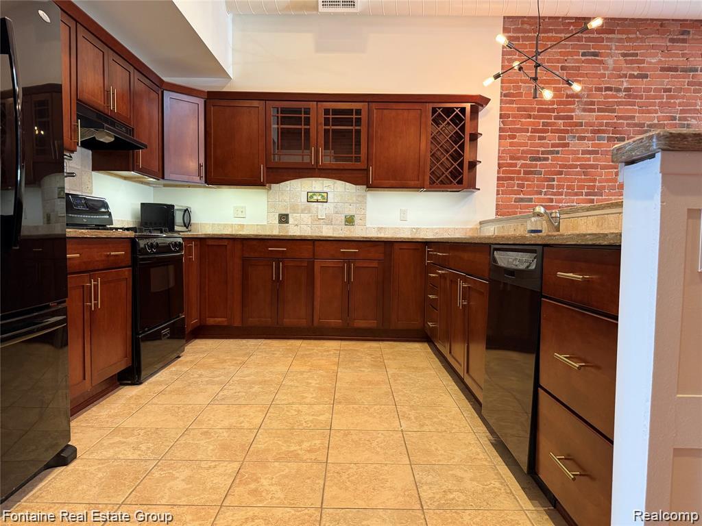 107 W Grand River Avenue