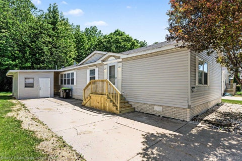 Photo of 45822 Bonaventure Dr, Macomb Township, MI 48044 (MLS # 20261041156)