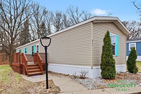 Photo of 6913 Sandwood Street NE, Plainfield Charter Township, MI 49341 (MLS # 65026010910)