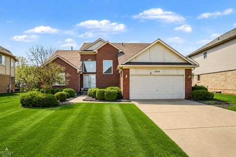 Photo of 47715 Beacon Sqaure Drive, Macomb Township, MI 48044 (MLS # 58050206151)