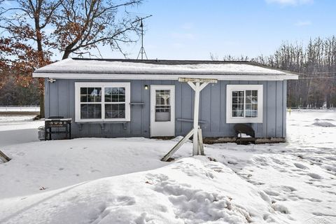 Photo of 9757 N Cut Road, Higgins Township, MI 48653 (MLS # 61050199629)