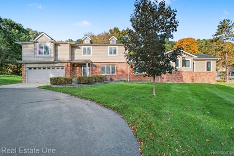 Photo of 9243 Sherwood Drive, Springfield Charter Township, MI 48350 (MLS # 20261082973)