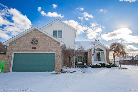 Photo of 16448 Trailway Drive, Macomb Township, MI 48042 (MLS # 20261004060)