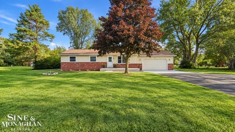 Photo of 2310 Fred W Moore Highway, Saint Clair Township, MI 48079 (MLS # 58050223029)