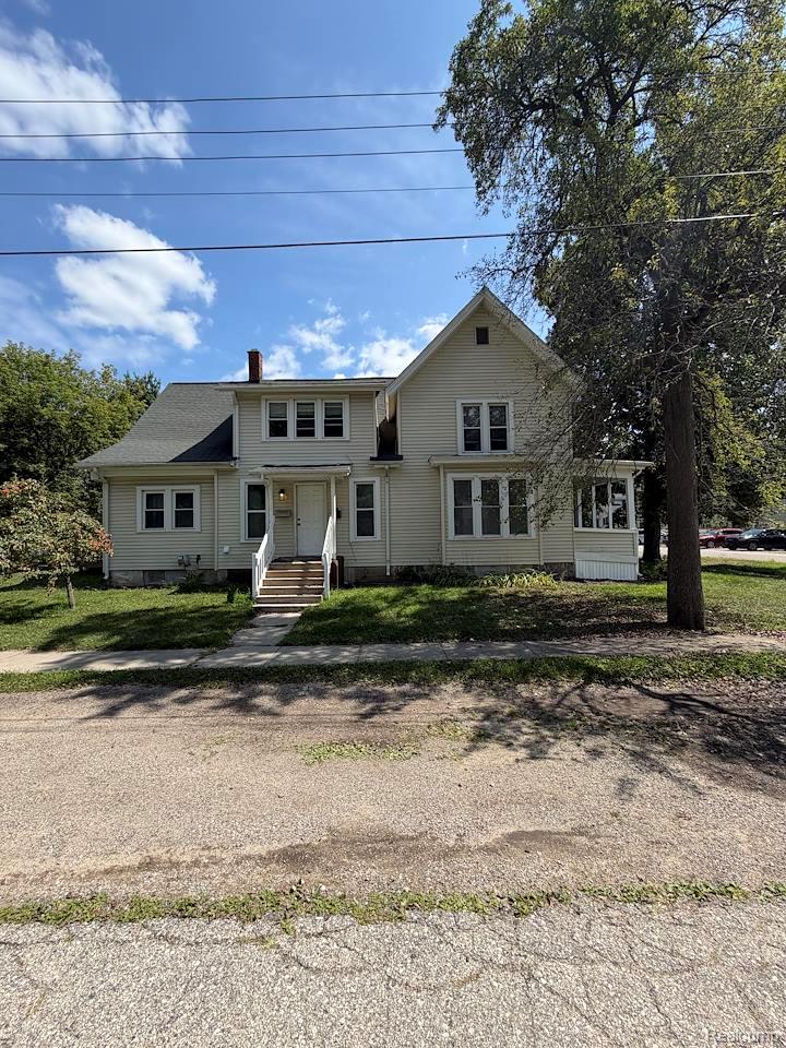 Photo of 205 E Shadbolt Street, Lake Orion Village, MI 48362 (MLS # 20261071362)