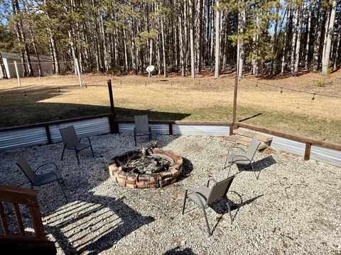 Tiny photo for 21238 Lakola Road, Burdell Township, MI 49688 (MLS # 78080066088)