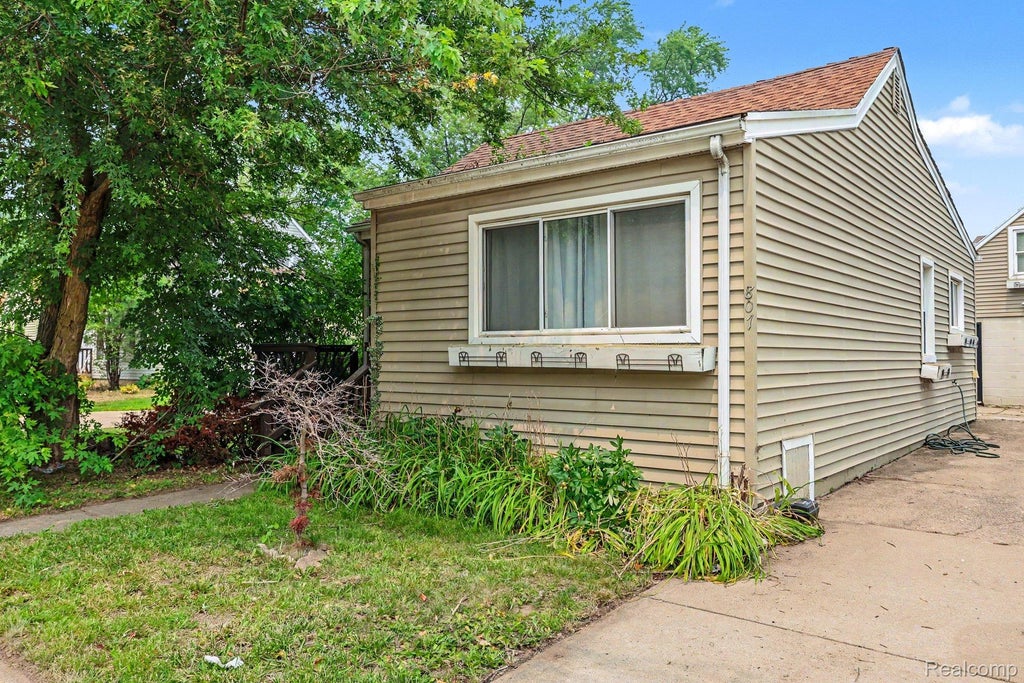 Photo of 807 E 14 Mile Road, Birmingham City, MI 48009 (MLS # 20261070859)