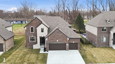 Photo of 50170 Kapalua Drive, Macomb Township, MI 48042 (MLS # 58050203087)
