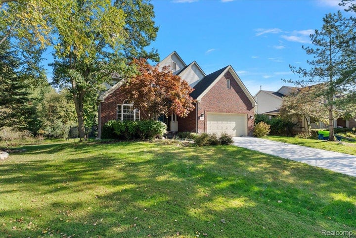 Brick and siding exterior with gabled roof lines
