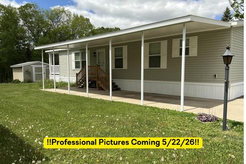 Photo of 140 Tamarack Avenue NE, Solon Township, MI 49319 (MLS # 65026023653)