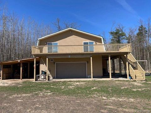 Photo of 265 HURON FOREST Drive, Mentor Township, MI 48647 (MLS # 20240038142)