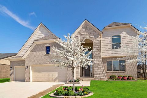 Photo of 50574 Mistwood Drive, Macomb Township, MI 48042 (MLS # 58050175580)