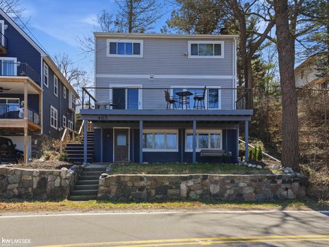 Photo of 465 Heights Road, Lake Orion Village, MI 48362 (MLS # 58050203916)