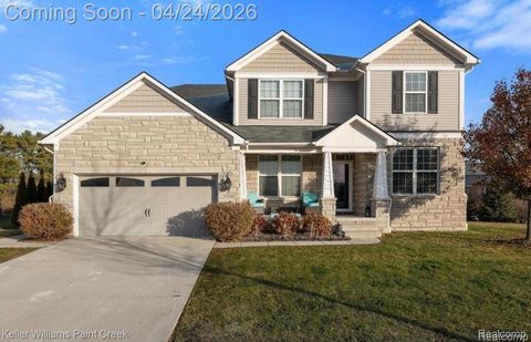 Photo of 16089 Diamante Drive, Macomb Township, MI 48044 (MLS # 20261027853)