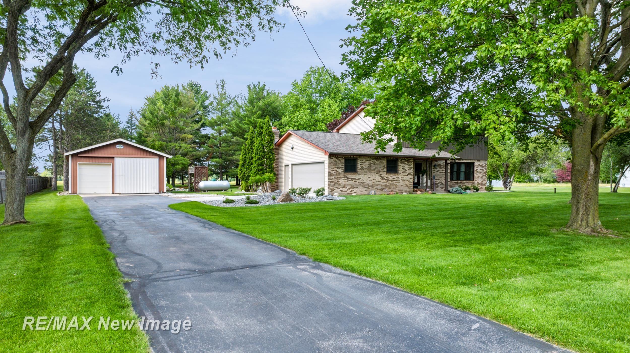 6180 W Freeland Road