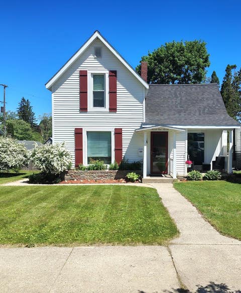 Photo of 717 E Garfield Street, Cadillac City, MI 49601 (MLS # 78080071795)