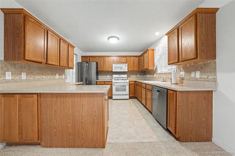 Tiny photo for 45467 Coachfort Drive, Macomb Township, MI 48044 (MLS # 20261021593)