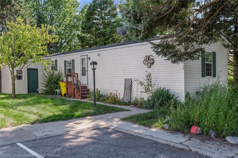 Photo of 17008 Dalworth St, Macomb Township, MI 48044 (MLS # 20251028683)