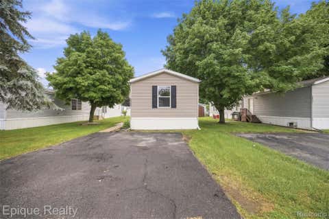 Photo of 48580 Pineview Drive, Shelby Charter Township, MI 48317 (MLS # 20261051782)