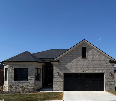 Photo of 55103 Saint Paul Drive, Macomb Township, MI 48042 (MLS # 58050208863)