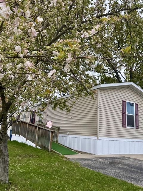 Photo of 1700 Robbins Road #164, Grand Haven City, MI 49417 (MLS # 71026022056)