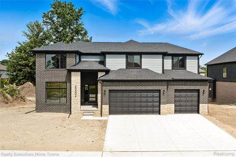 Photo of 50733 MISTWOOD Drive, Macomb Township, MI 48042 (MLS # 20251019664)