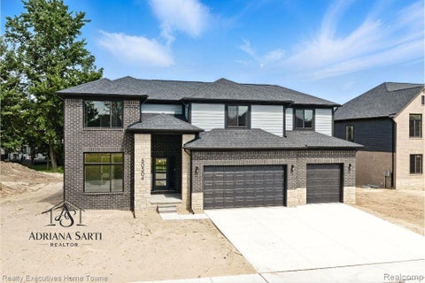 Photo of 50733 MISTWOOD Drive, Macomb Township, MI 48042 (MLS # 20251019664)