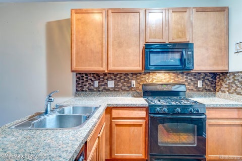 Tiny photo for 2195 PRESERVE Circle E #97, Canton Charter Township, MI 48188 (MLS # 20261079829)