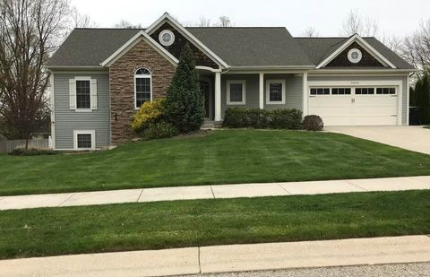 Photo of 5262 Naples Cedar Drive SW, Wyoming City, MI 49519 (MLS # 65025061836)