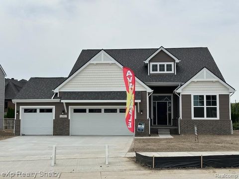 Photo of 52937 WELLINGTON VALLEY Drive, Macomb Township, MI 48042 (MLS # 20240085736)