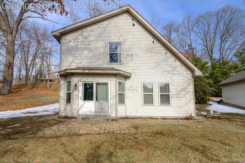 Photo of 7373 Valley Drive, Hamburg Township, MI 48116 (MLS # 20261010008)